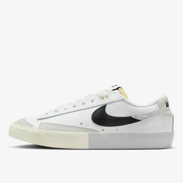 Shop Nike Blazer Low ’77 Split Sneakers in White, Black, and Grey. Featuring a leather & suede build with signature padded tongues and a unique “Split” design.