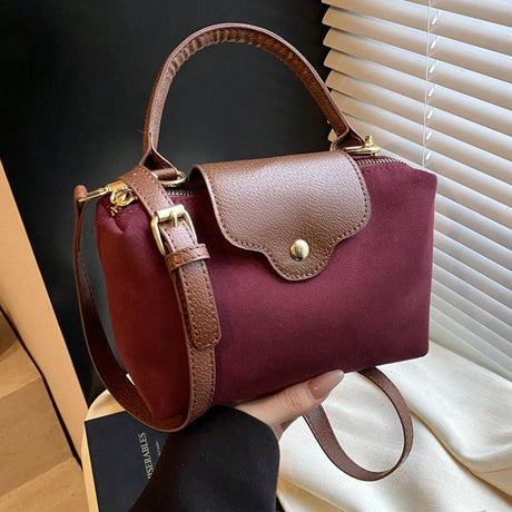 Retro Nylon Dumpling Bag - Attribute Details Style Fashionable Features Lightweight Color Burgundy Magnetic No Bag Size Mini Closure Type Zipper Strap Type Top Handle Details Buckle, Spiked Pattern Type Colorblock, Colorful Type Square Bag Coating 100% Po